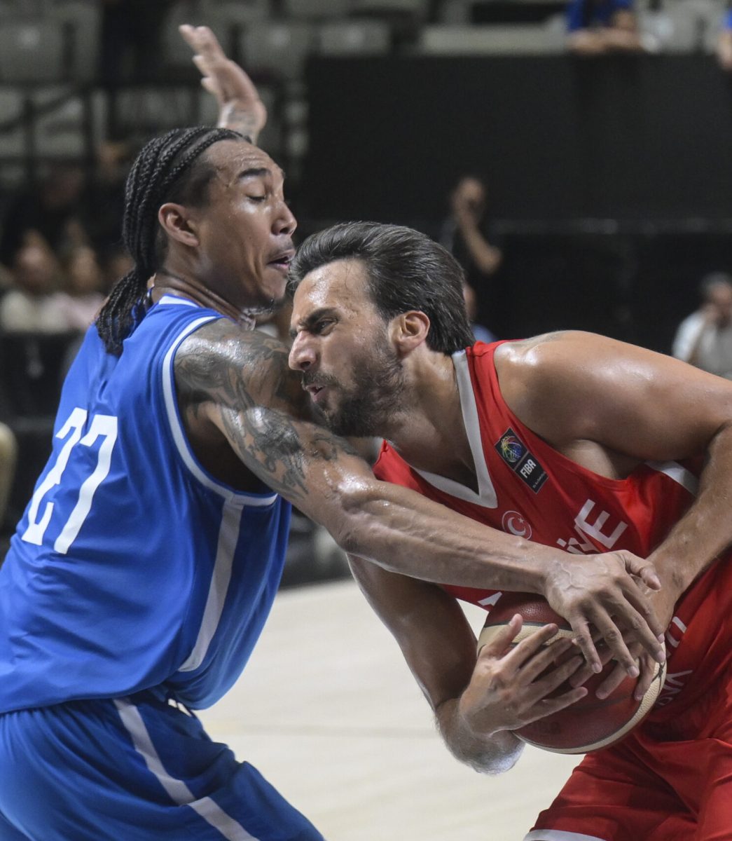 ISTANBUL, TURKIYE - JUNE 27: Can Korkmaz (R) of Turkiye in action against Chris Newsome (L) of Philippines during the preparation match for the FIBA 2025 EuroBasket Qualifiers between Turkiye and Philippines in Istanbul, Turkiye on June 27, 2024. (Photo by Mehmet Murat Onel/Anadolu via Getty Images)