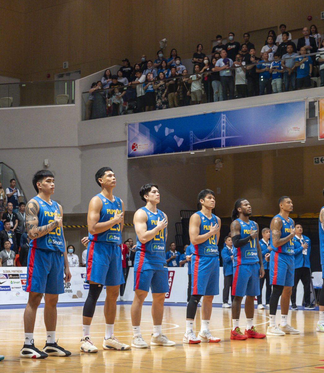 HONG KONG, CHINA - FEBRUARY 22: Team Philippines players line up for the national anthem prior to during the FIBA Asia Cup Qualifier Group B game between Hong Kong and Philippines at Tsuen Wan Stadium on February 22, 2024 in Hong Kong, China. (Photo by Yu Chun Christopher Wong/Eurasia Sport Images/Getty Images)